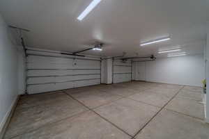 Garage featuring a garage door opener