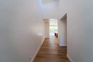 Hallway featuring hardwood / wood-style flooring