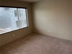 Spare room with carpet floors