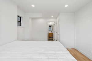 Bedroom featuring hardwood / wood-style flooring