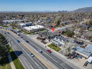 Birds eye view of property with a mountain view