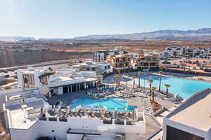 View of pool with a mountain view