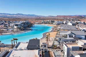 Birds eye view of property with a mountain view