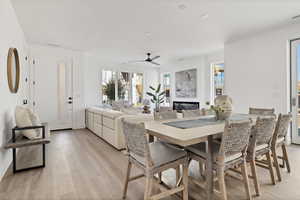 Dining area featuring ceiling fan and light hardwood / wood-style floors