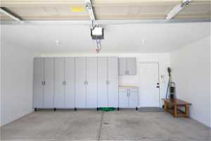 Painted garage with built in custom cabinets