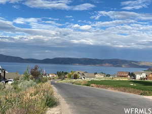 Property view of water with a mountain view