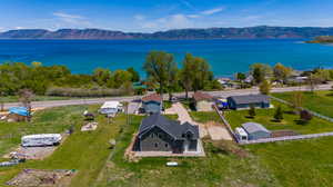 Bird's eye view featuring a water and mountain view