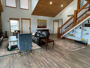 Living room with high vaulted ceiling