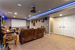 living room in basement with theater