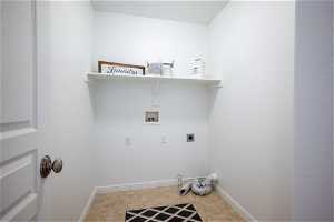 Laundry area with electric & gas Dryer hookup, tile floors
