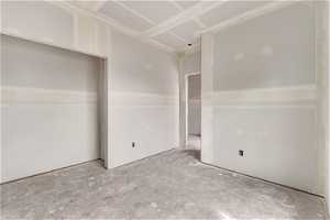 Empty room featuring concrete floors