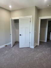 bedroom 3 with carpet flooring