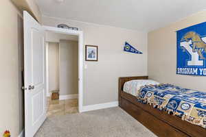 Bedroom featuring carpet floors