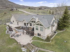 Birds eye view of property with a mountain view