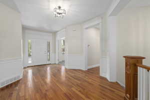 Foyer featuring hardwood floors