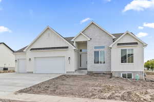 View of front of home featuring a garage