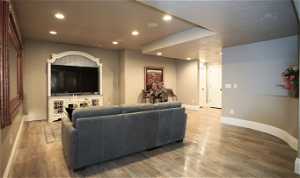 Basement living room with Luxury Vinyl Plank (LVP) flooring
