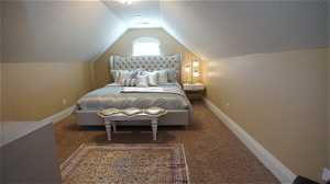 Upstairs bedroom #4 or Bonus room with vaulted ceiling and a textured ceiling