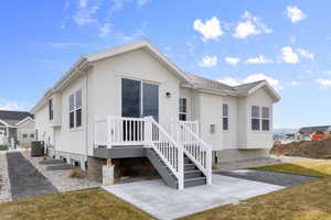 Back of property with central AC unit