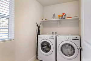 Washroom with separate washer and dryer and hookup for a washing machine