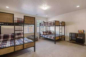 Bedroom featuring carpet floors