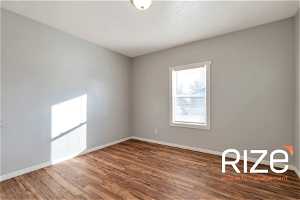 Spare room with hardwood / wood-style flooring2431 B Ave