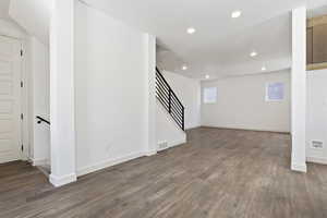 Basement with wood-type flooring