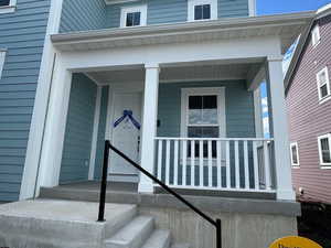 Entrance to property with a porch