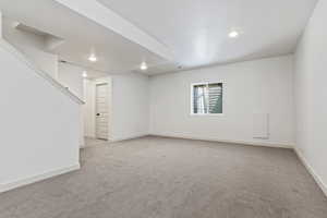 Basement with carpet