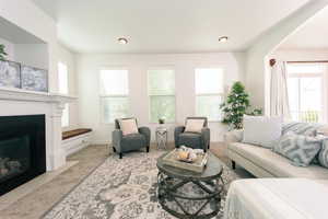 Tiled living room with a tile gas fireplace