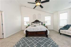 Master Bedroom Suite with lofted ceiling, carpet floors, and ceiling fan