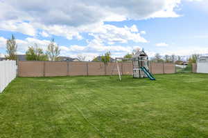 View of yard with a playground