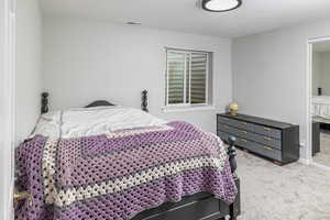 View of carpeted bedroom