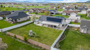 Birds eye view of property with a mountain view