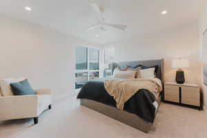 Bedroom with light carpet, recessed lighting, and ceiling fan