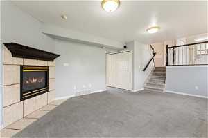 Family Room, Fireplace and Stairs