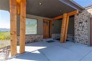 Impressive exterior finish of natural wood timbers and rock