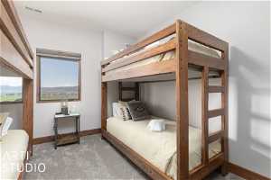 Comfortably sleep 4 in this bedroom furnished with fun solid wood bunks!