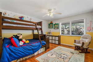 Children's Bedroom withentrance to the 3/4 bathroom and a walkin closet