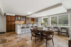 Step Outside onto this deck from the Kitchenette/Family Room