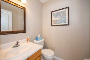 Bathroom featuring toilet and vanity