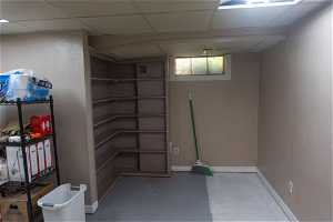 Basement storage room with built-in shelving