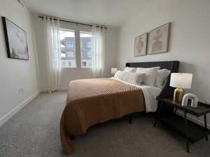 Bedroom with carpet flooring