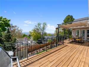 deck off great room and kitchen with valley views