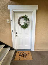 A cheery building and an open breezeway will greet you to your new home!