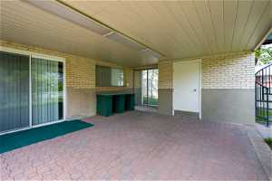 Covered Patio with Shed for Storing Tables and Chairs! Perfect for Entertaining your Family and Friends! Walkout from the Downstairs Family Room!