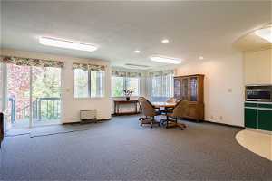 Great Room looking toward Dining Area! Very Spacious with many Windows that stream in tons of Natural Light!