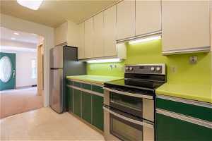 Retro Kitchen with Stainless Steel Appliances and Double Ovens!
