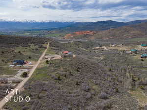 Birds eye view of property featuring a mountain view