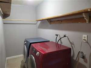 Laundry room with washing machine and dryer. Community laundry room is also available.